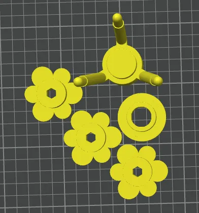Five scaled-down flower parts arranged so they all fit on one plate