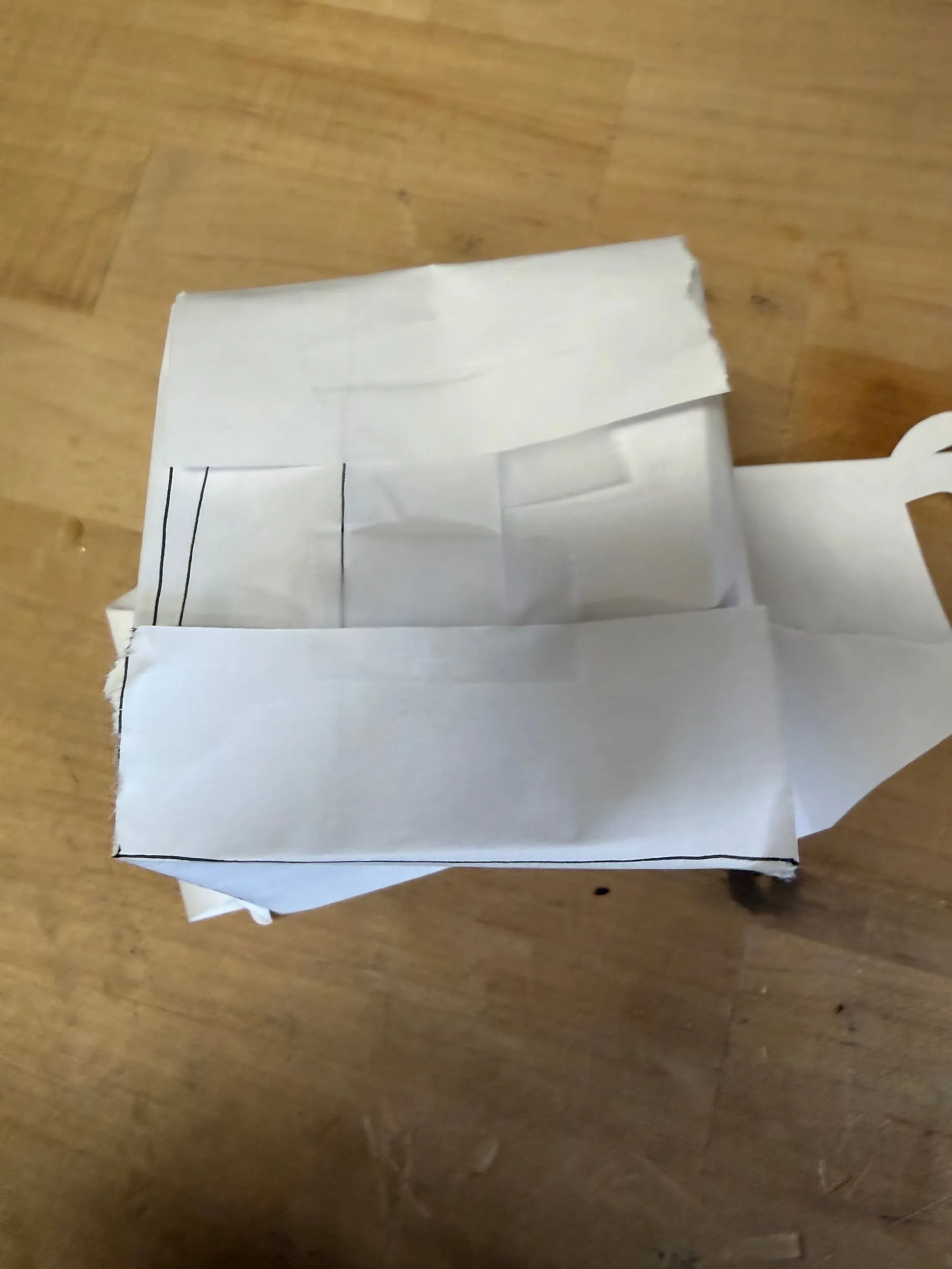 Taping the vertical bottom flaps together