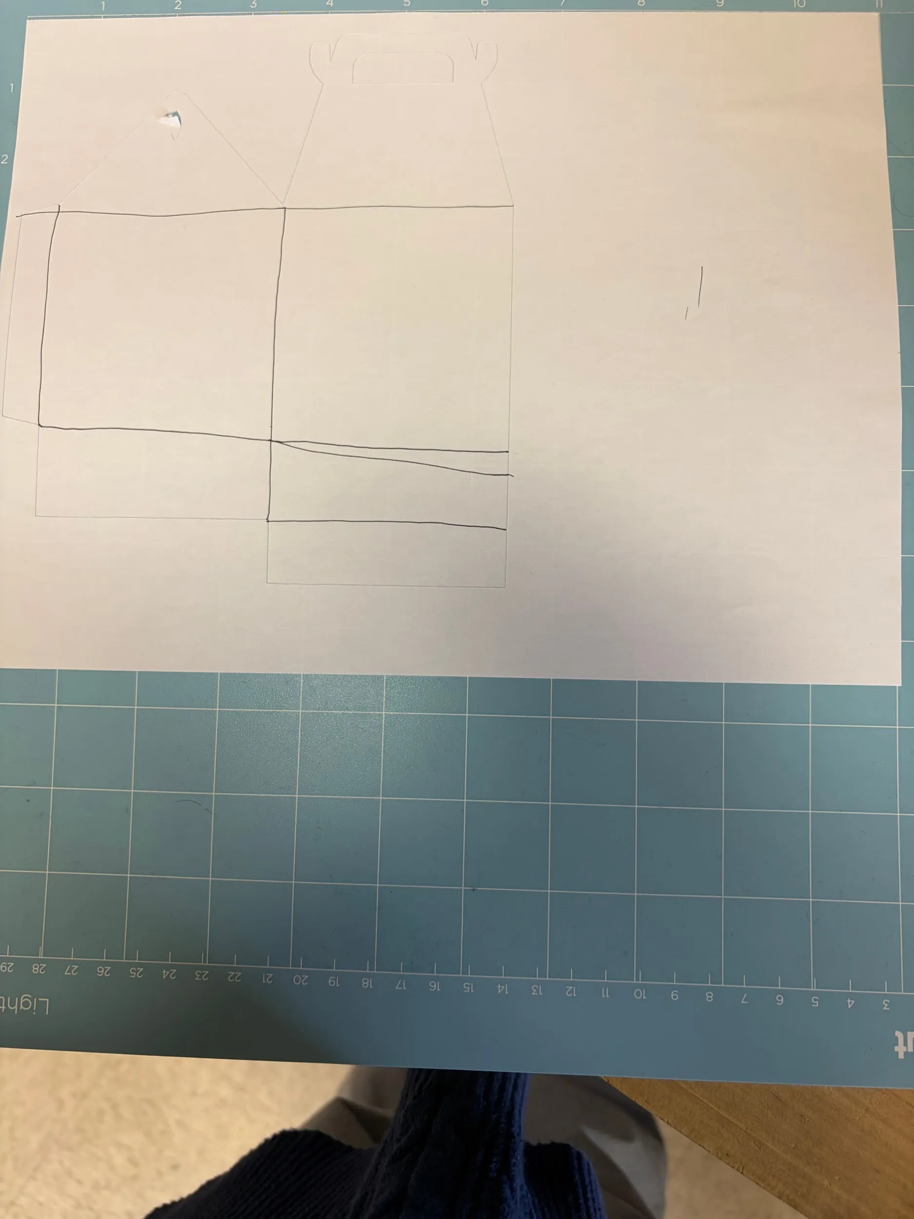 The cut piece with the fold lines marked