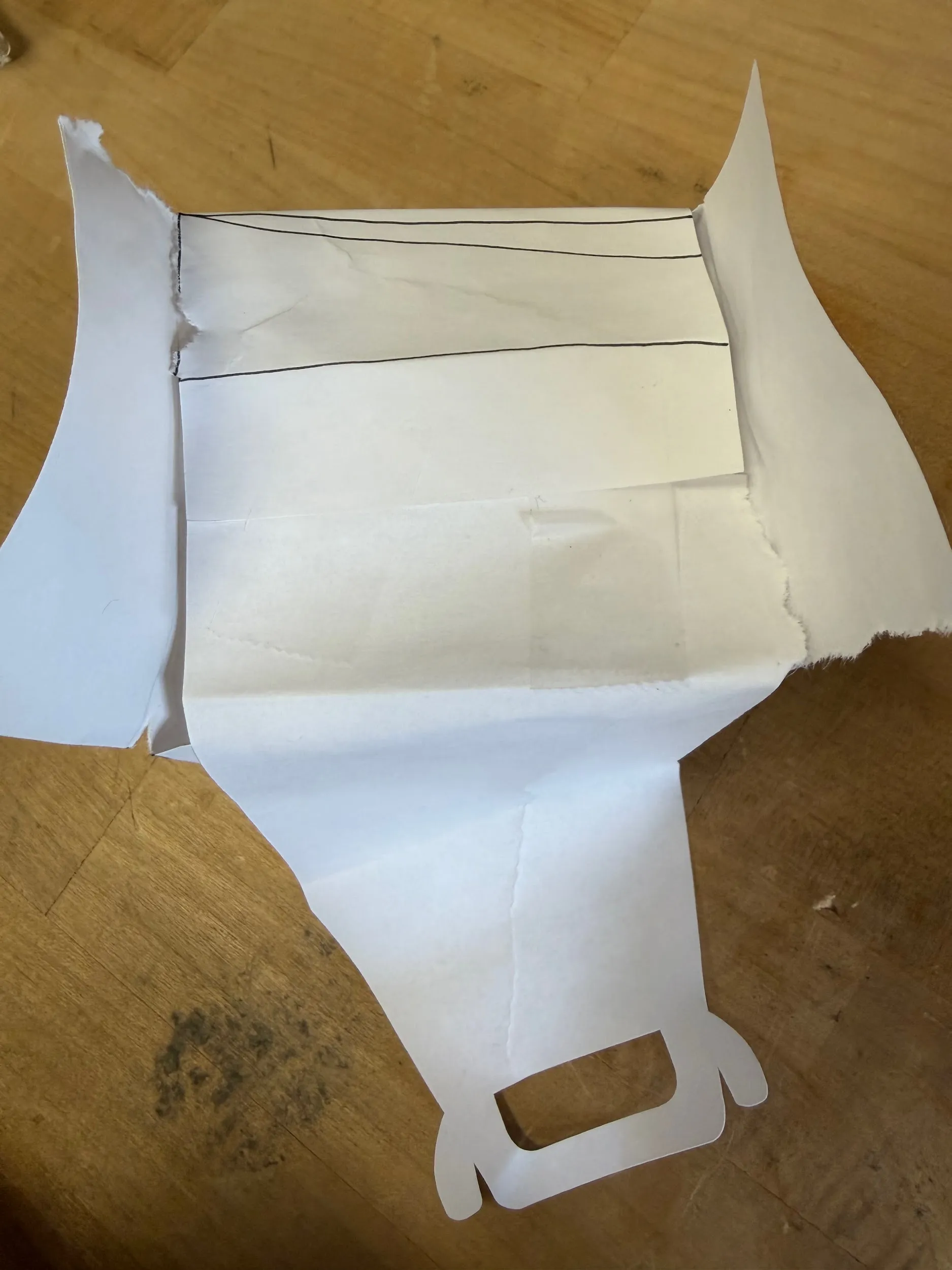 Taping the horizontal bottom flaps together