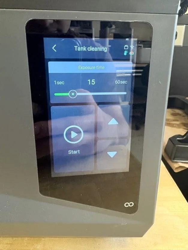 The Tank cleaning screen on the printer touchscreen with the exposure time slider set to 15 seconds and a Start button