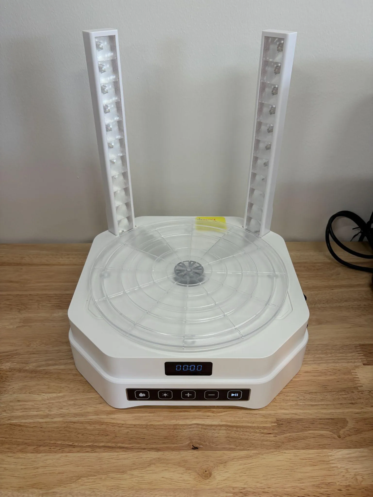 The Mercury base with the curing turntable fitted and the two UV lamp columns standing either side, cover removed